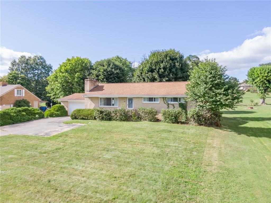 282 Vogel Road Butler, PA 16002 - Photo 2 of 3 front view of a house with a yard