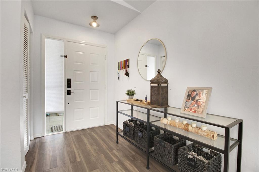 3342 Timberwood Circle Naples, FL 34105 - Photo 4 of 25 a living room with furniture