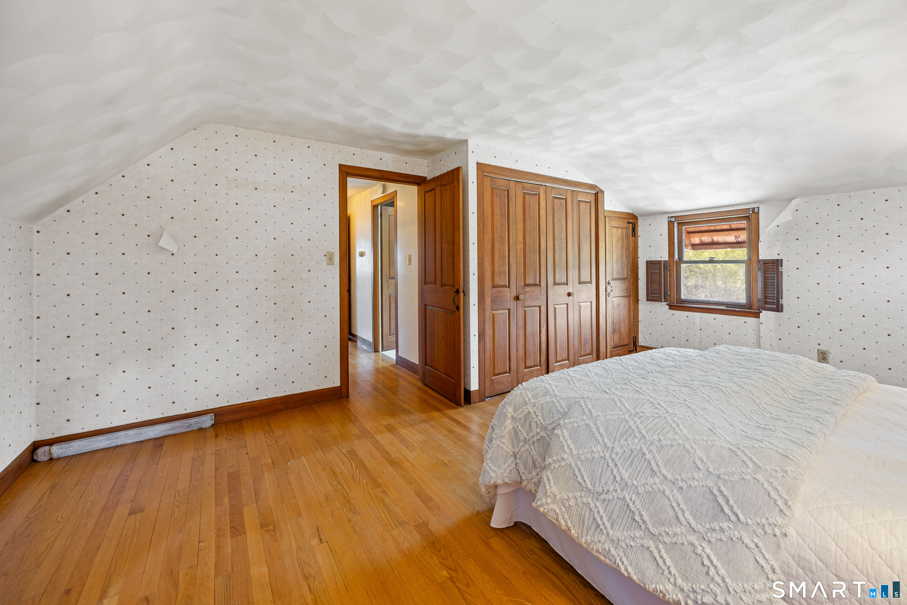 52 Susan Lane Meriden, CT 06450 - Photo 20 of 28 a spacious bedroom with a bed and a dresser