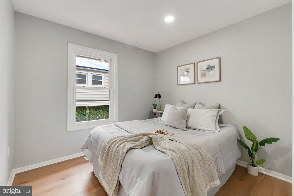 18 Rollwin Road Baltimore, MD 21244 - Photo 15 of 27 a bedroom with a bed and a window