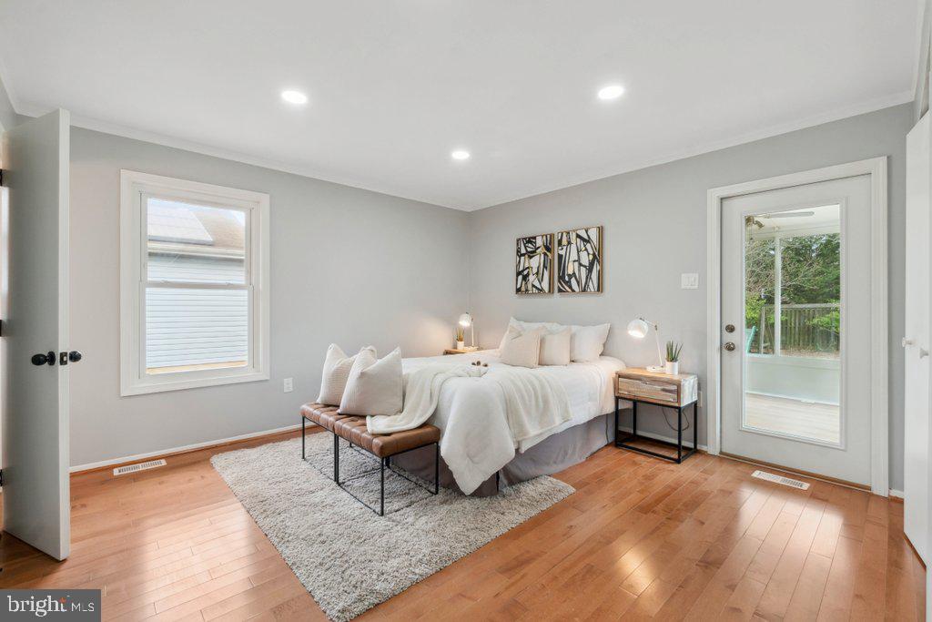 18 Rollwin Road Baltimore, MD 21244 - Photo 18 of 27 a spacious bedroom with a bed and a window