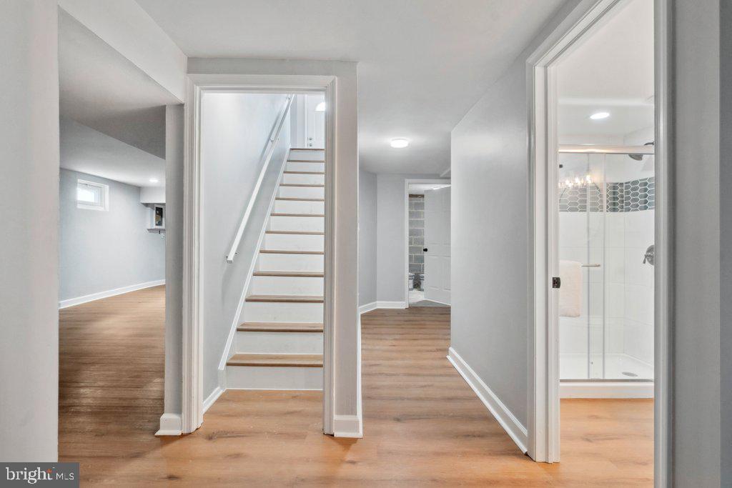 18 Rollwin Road Baltimore, MD 21244 - Photo 22 of 27 a view of a hallway with wooden floor and entryway