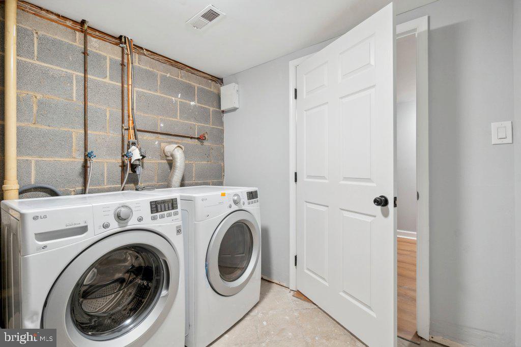 18 Rollwin Road Baltimore, MD 21244 - Photo 26 of 27 a view of livingroom with washer and dryer
