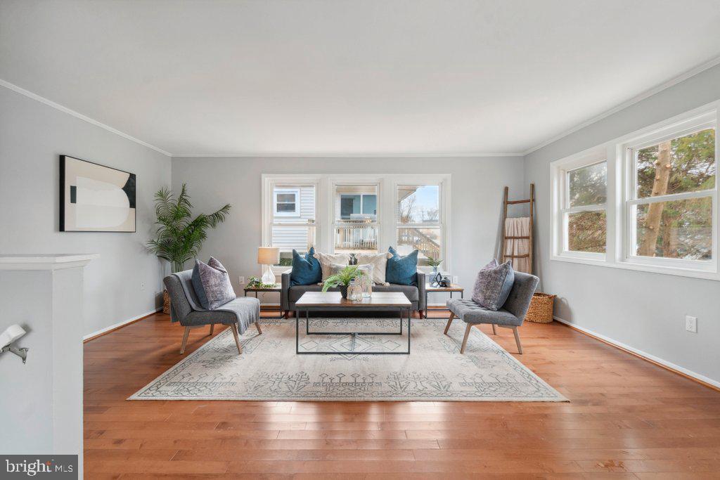 18 Rollwin Road Baltimore, MD 21244 - Photo 7 of 27 a living room with furniture window and wooden floor