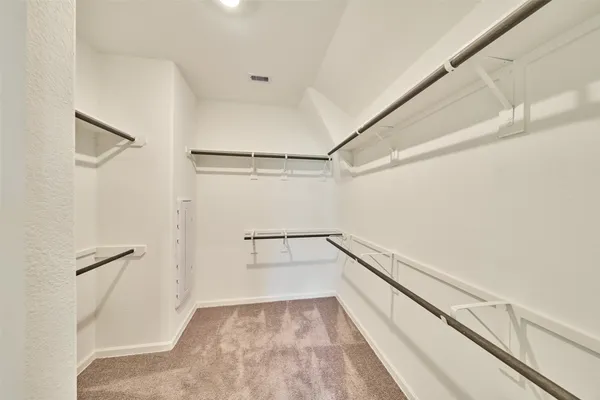 a bathroom with a double vanity sink mirror double and shower