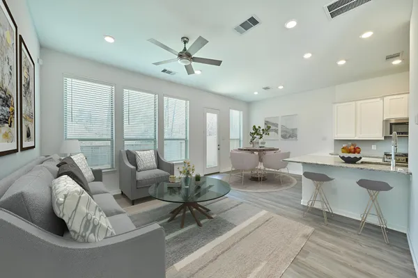 a view of an entryway with wooden floor