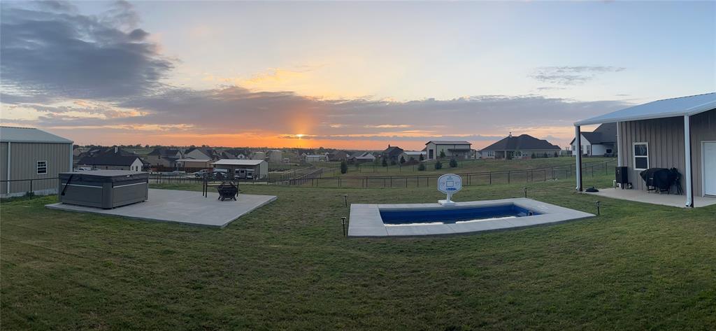 150 Spanish Moss Trail Rhome, TX 76078 - Photo 29 of 30 backyard at dusk