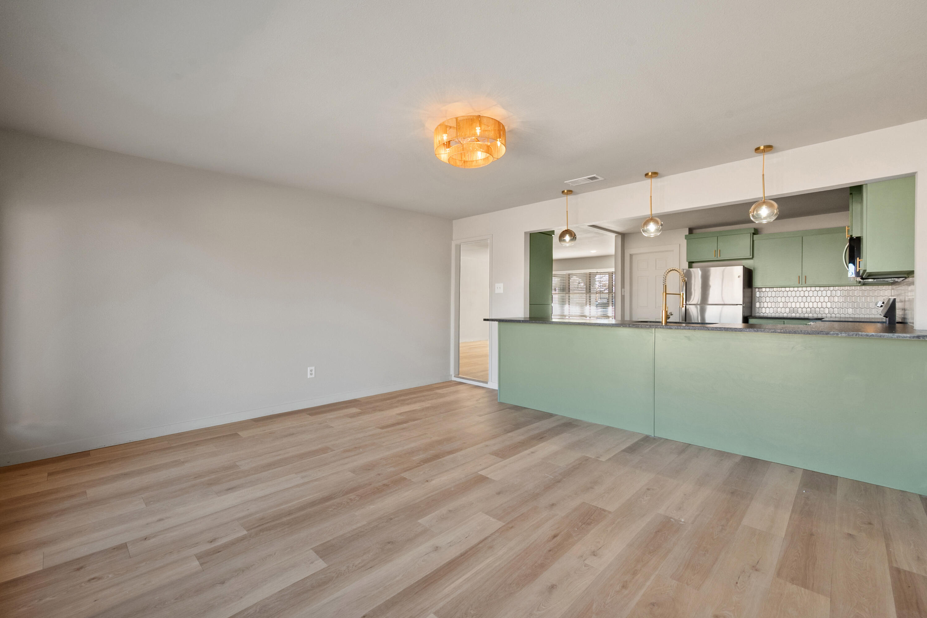 2504 53rd Street Lubbock, TX 79413 - Photo 12 of 28 a view of a kitchen and window