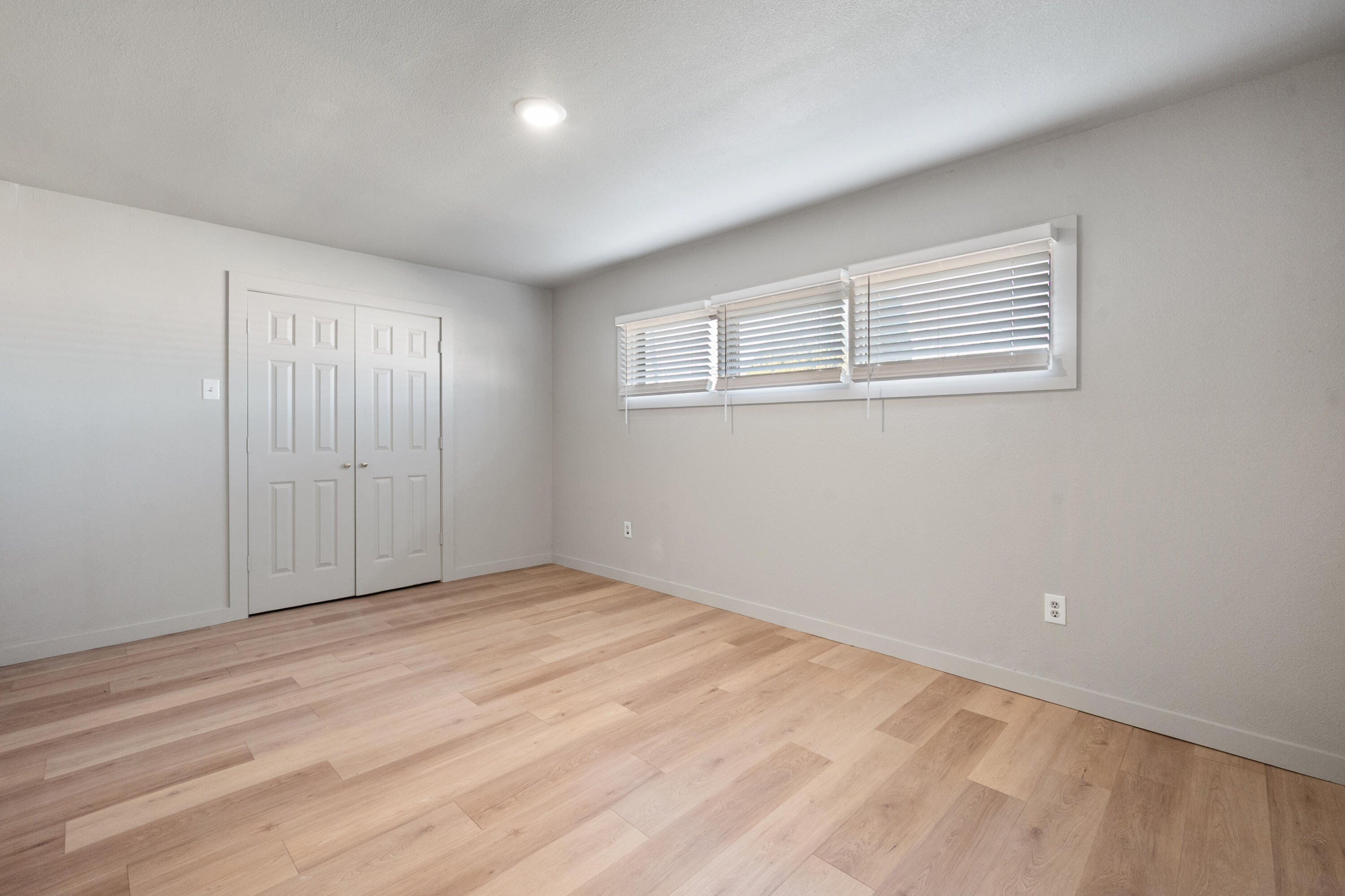 2504 53rd Street Lubbock, TX 79413 - Photo 22 of 28 a view of an empty room with wooden floor