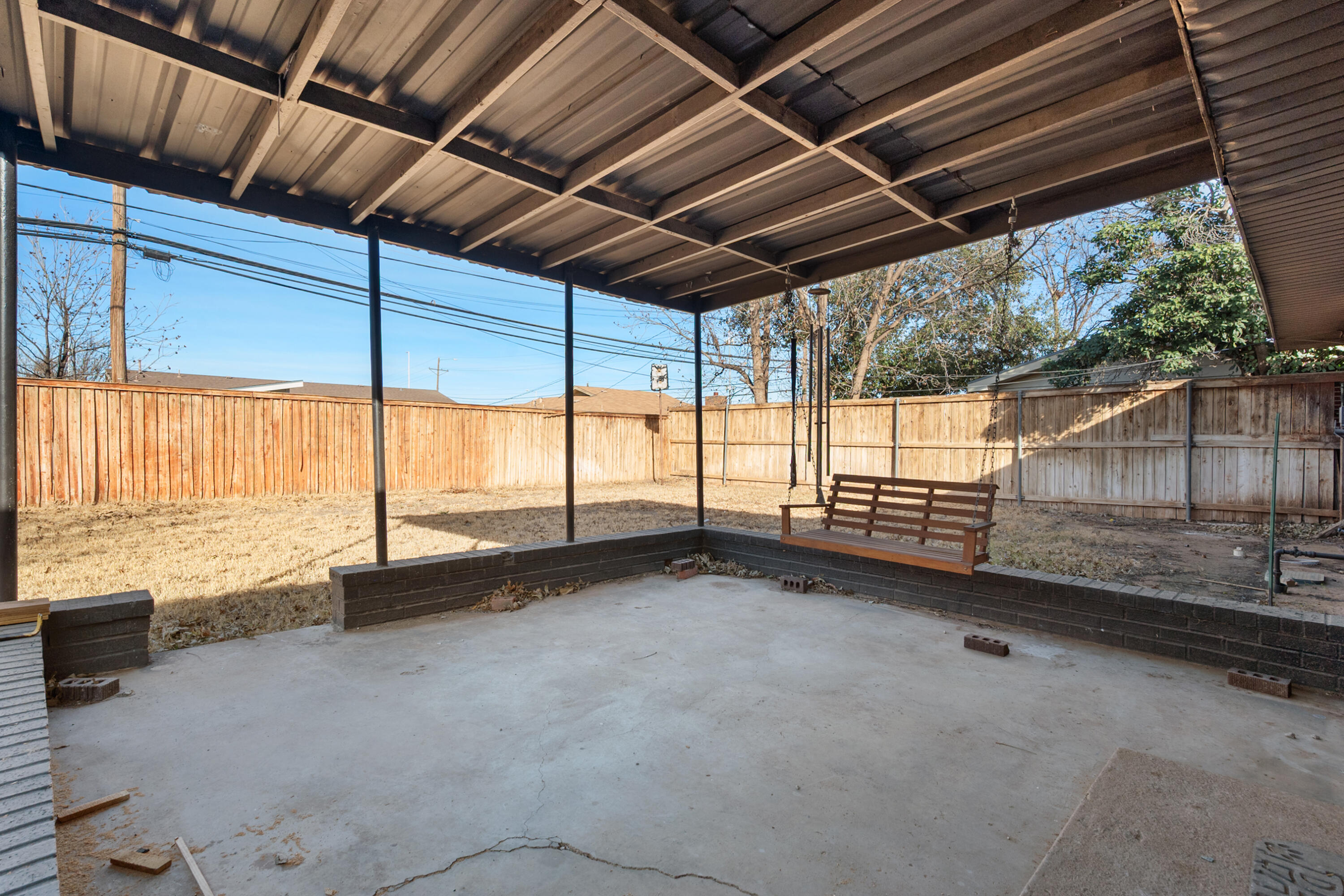2504 53rd Street Lubbock, TX 79413 - Photo 26 of 28 a view of an empty room with a sliding door