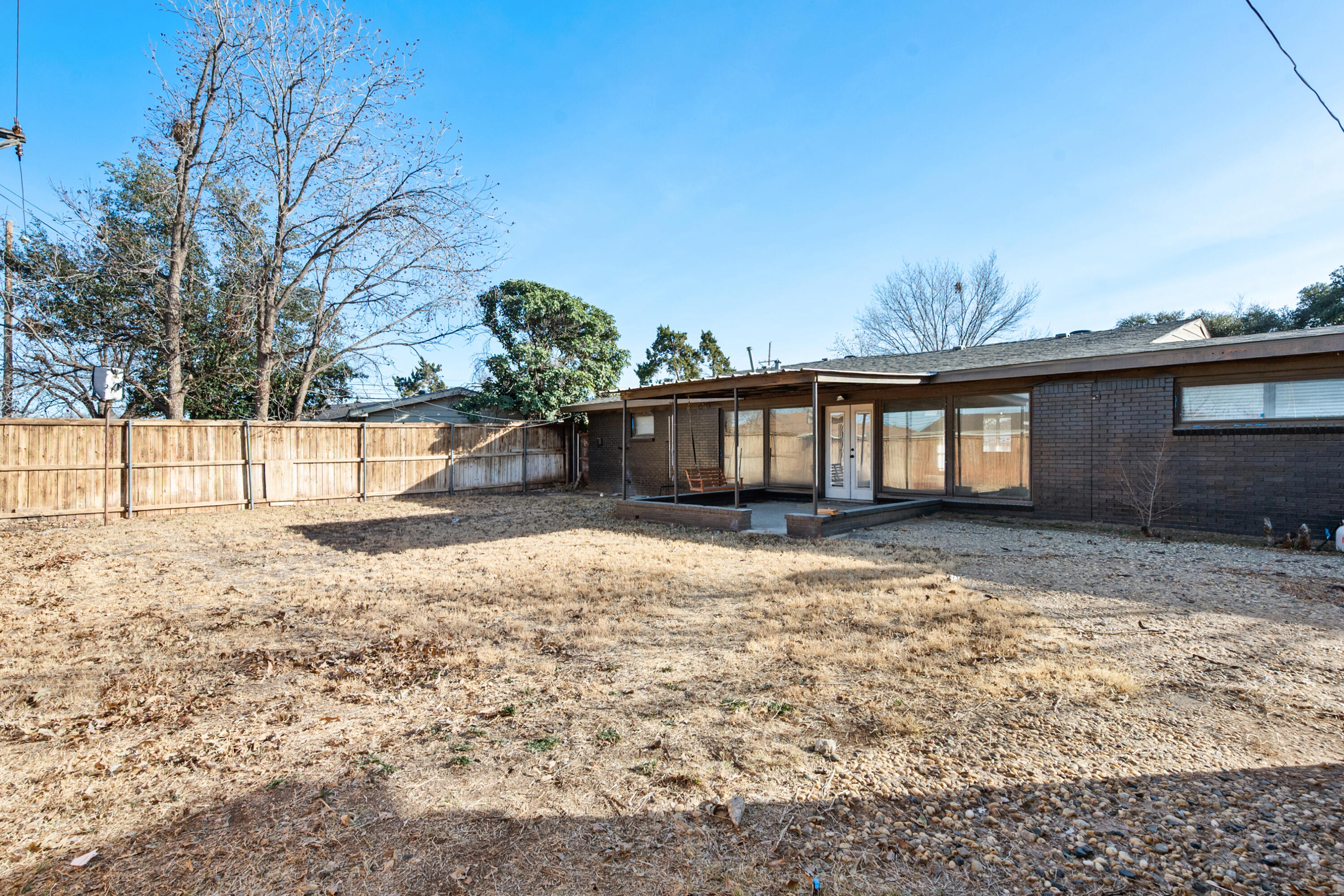 2504 53rd Street Lubbock, TX 79413 - Photo 28 of 28 a view of a house with a yard