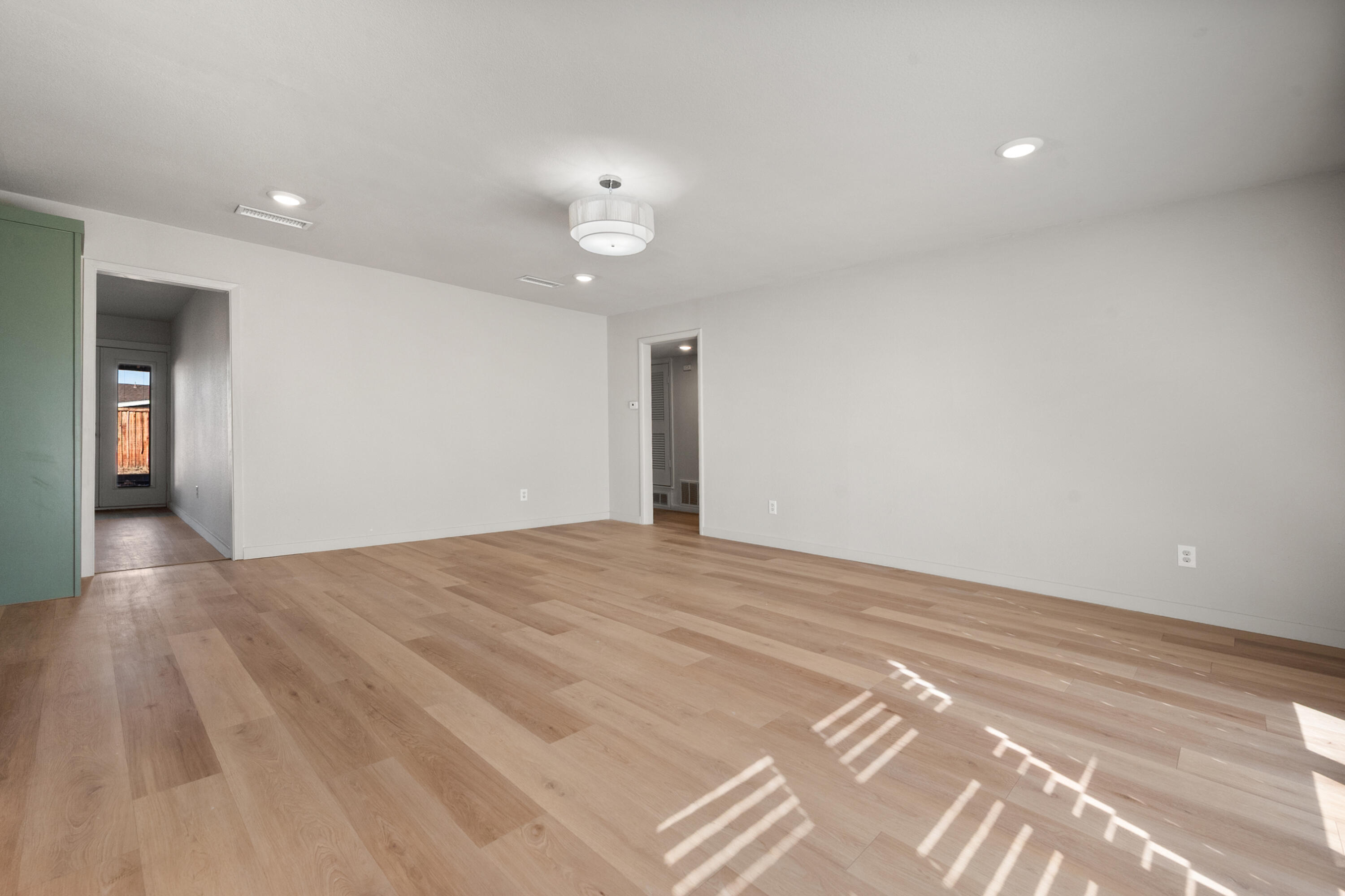 2504 53rd Street Lubbock, TX 79413 - Photo 3 of 28 a view of empty room with wooden floor