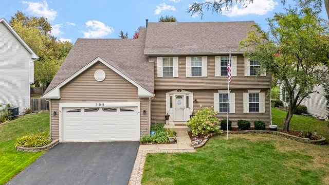 front view of a house with a yard