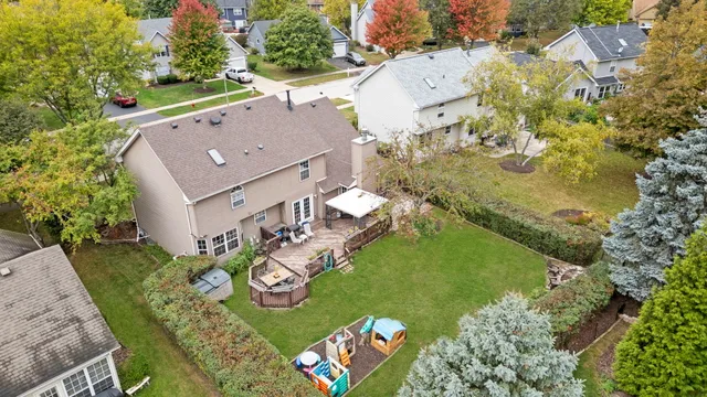 an aerial view of a house with a garden