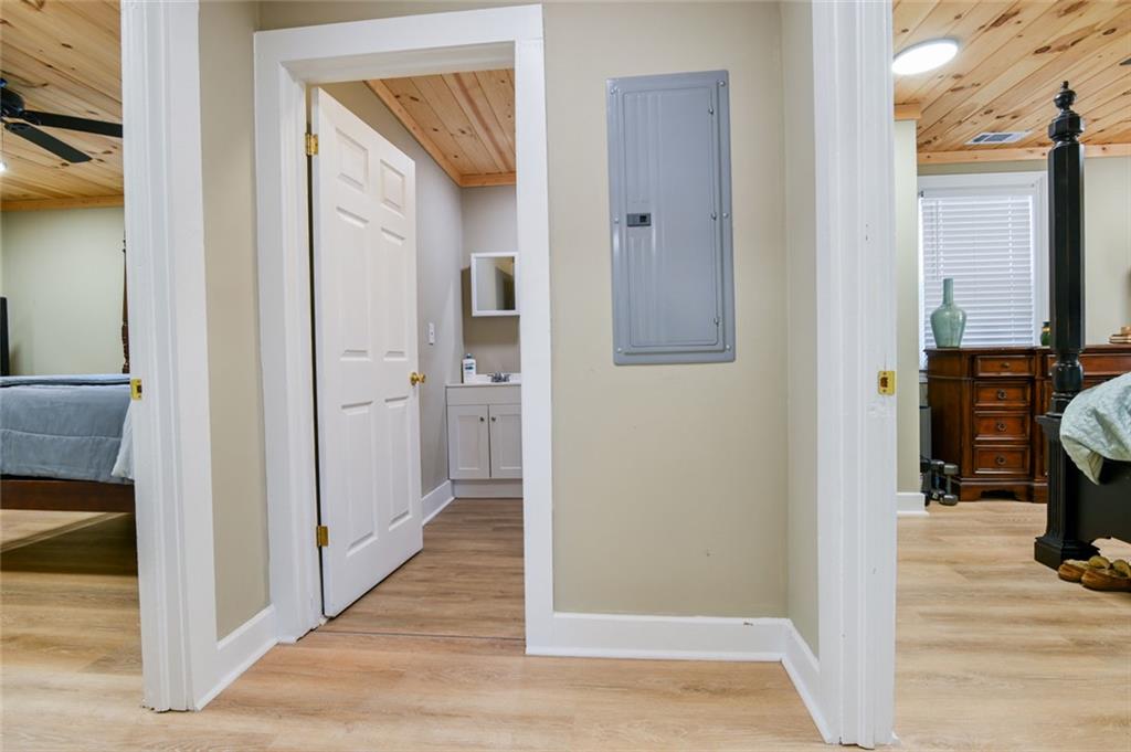 1160 Moody Street Union Point, GA 30669 - Photo 21 of 39 a view of a hallway with wooden floor and a livingroom