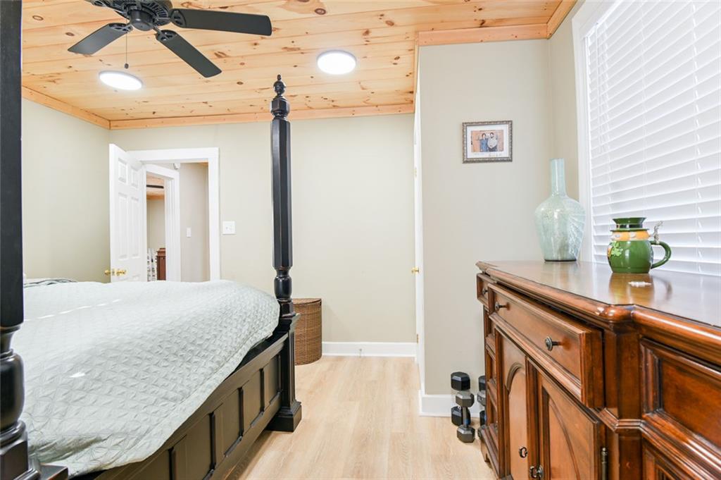 1160 Moody Street Union Point, GA 30669 - Photo 25 of 39 a bathroom with a granite countertop sink and a mirror