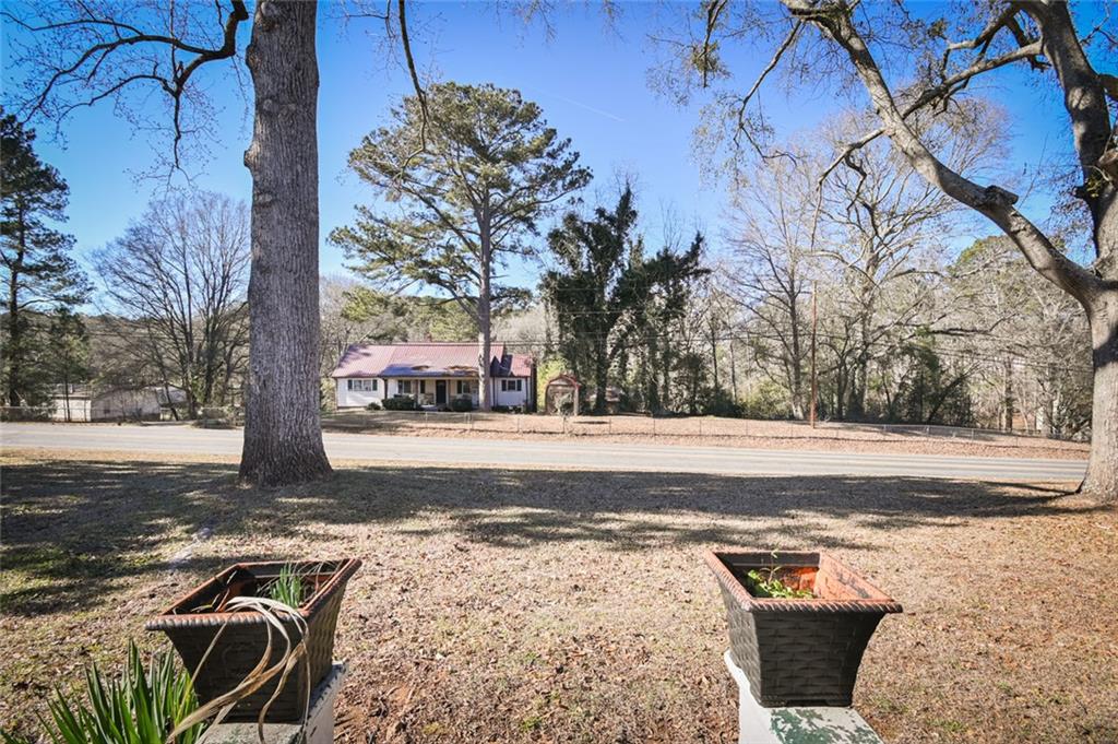 1160 Moody Street Union Point, GA 30669 - Photo 28 of 39 a view of a yard with trees