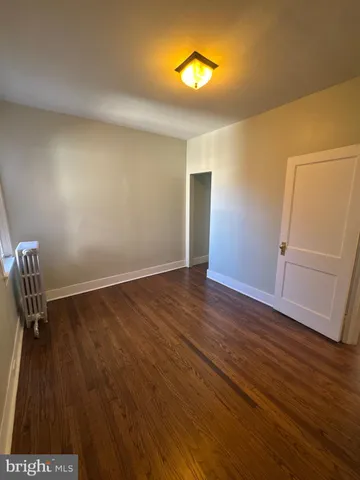 a spacious bathroom with a bathtub and a shower