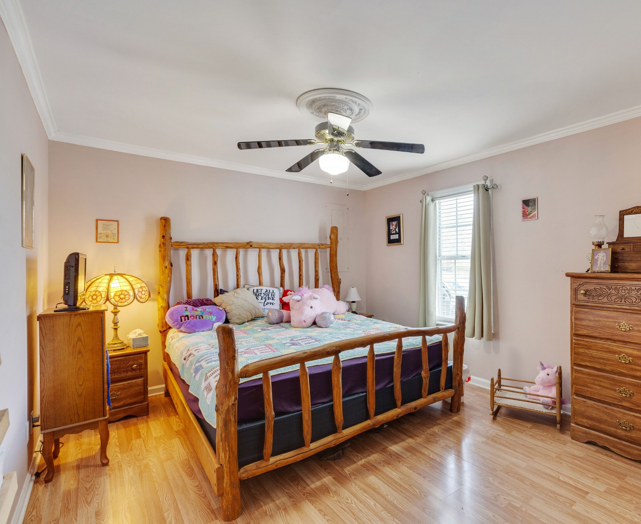 1370 McCool Road Lewisburg, TN 37091 - Photo 11 of 19 a bedroom with a bed and wooden floor