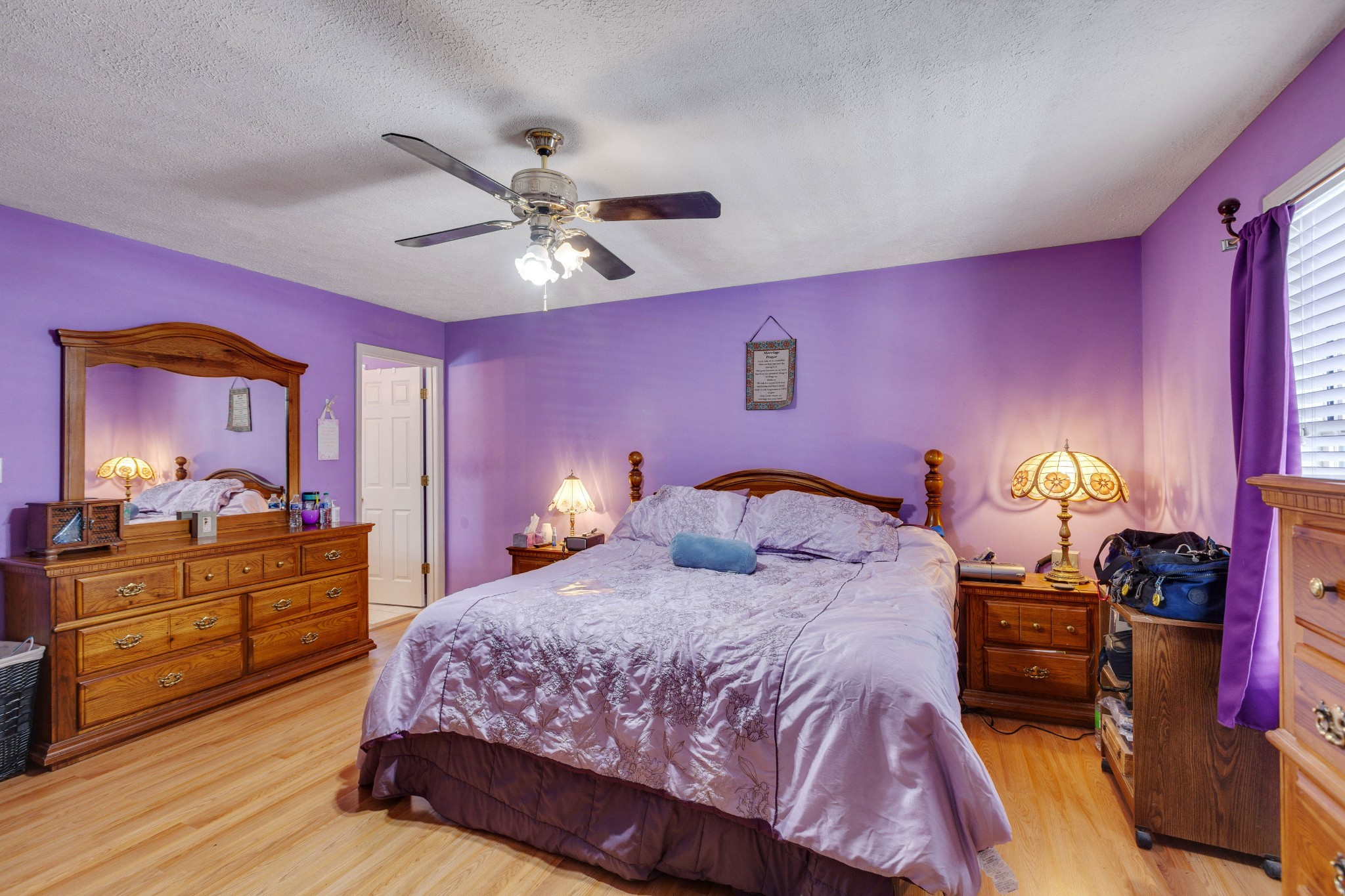 1370 McCool Road Lewisburg, TN 37091 - Photo 12 of 19 a bedroom with a bed and dresser with mirror