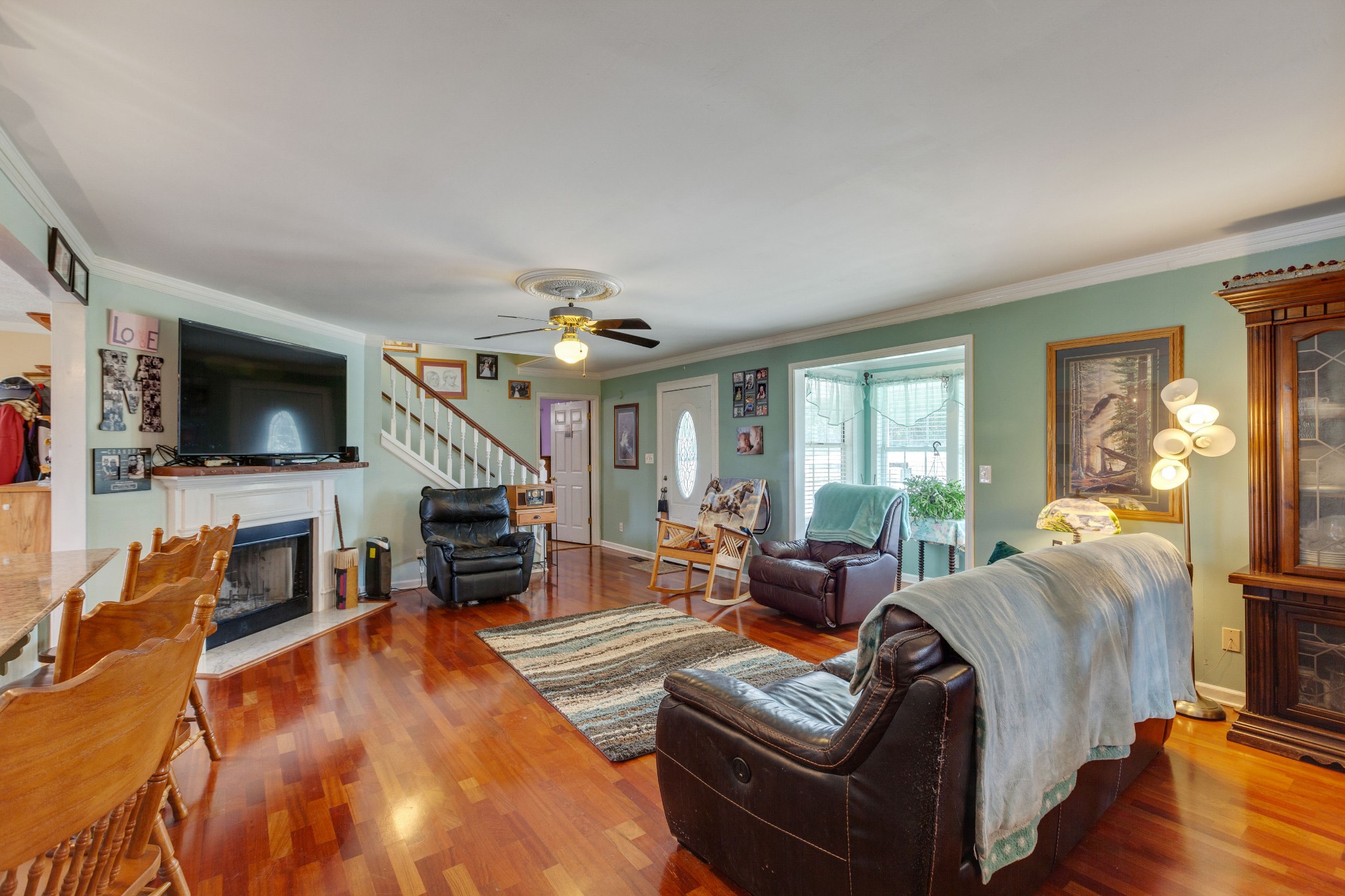1370 McCool Road Lewisburg, TN 37091 - Photo 6 of 19 a living room with furniture and a flat screen tv