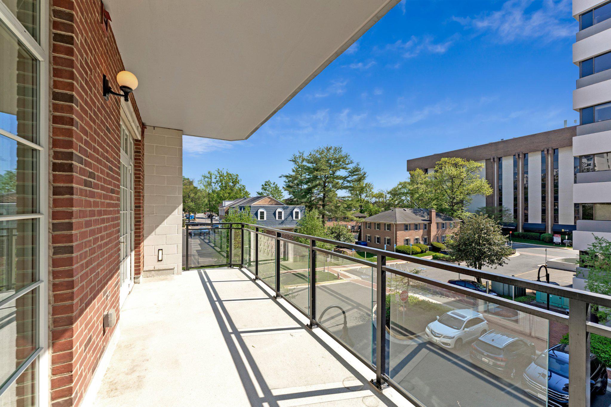 6900 Fleetwood Road, Unit 318 McLean, VA 22101 - Photo 19 of 63 a view of balcony with a potted plant