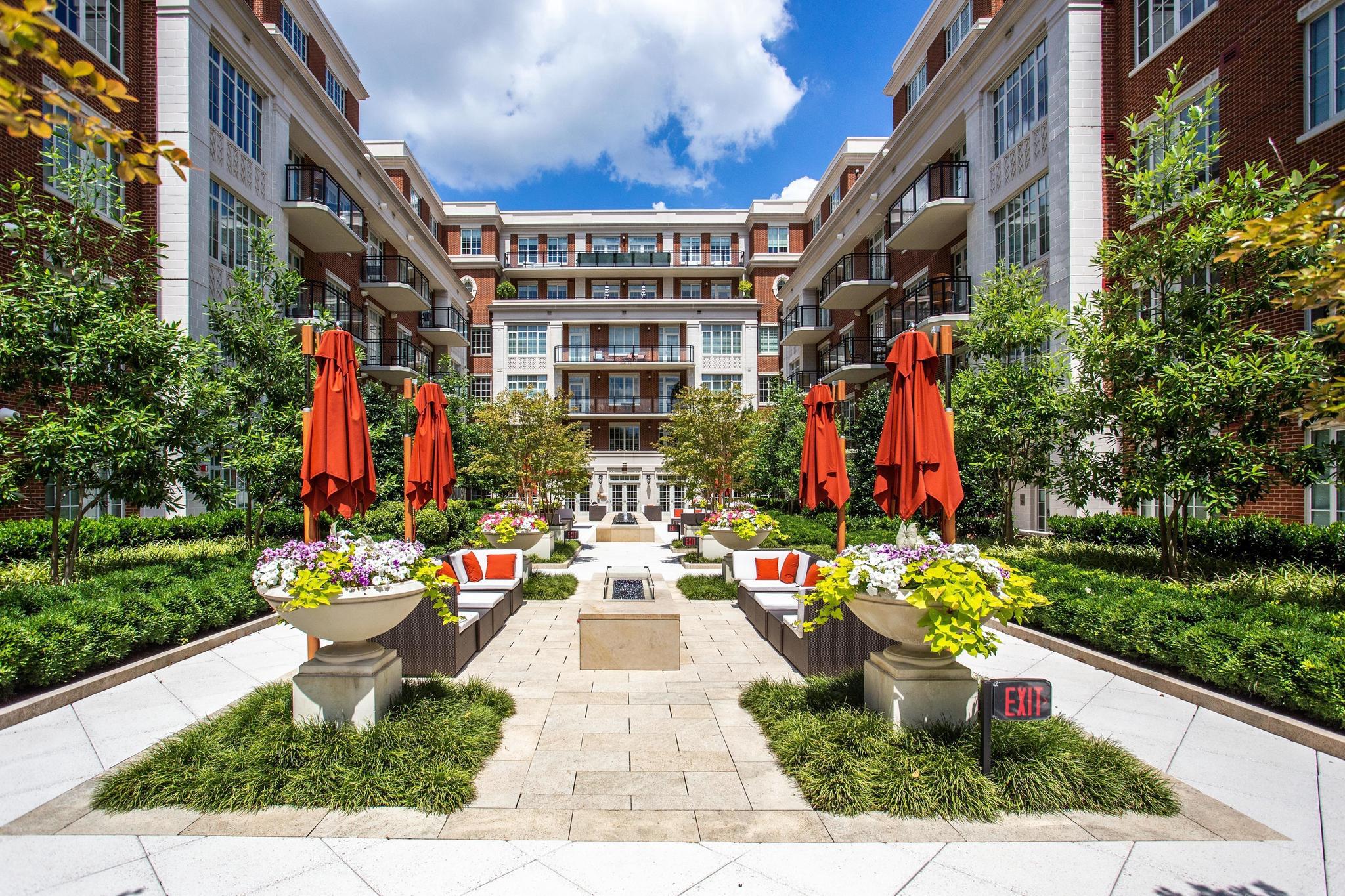 6900 Fleetwood Road, Unit 318 McLean, VA 22101 - Photo 49 of 63 a front view of a multi story building with yard
