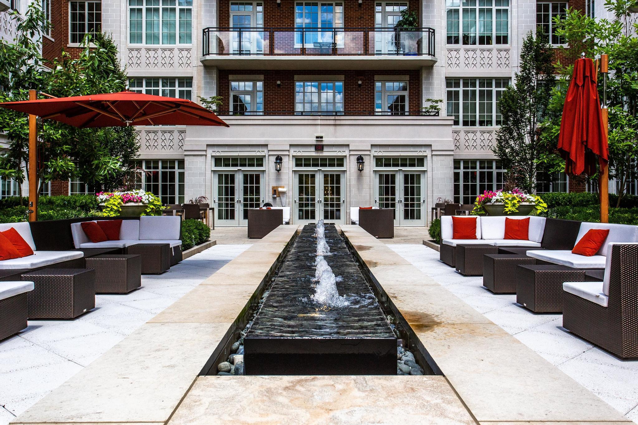 6900 Fleetwood Road, Unit 318 McLean, VA 22101 - Photo 53 of 63 a view of a building with a patio