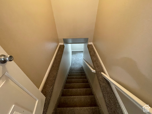 11473 South Dempsey Creek Road Lava Hot Springs, ID 83246 - Photo 21 of 47 Stairs with baseboards and carpet flooring