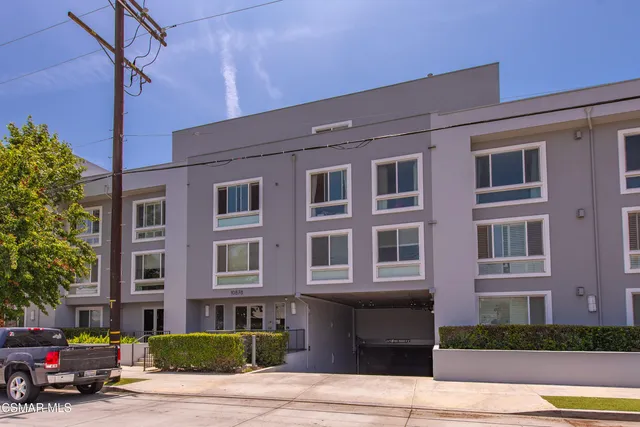 a cars parked in front of a building