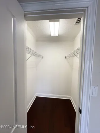 a bathroom with a sink and cabinets