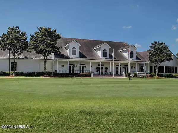a view of lake with green space
