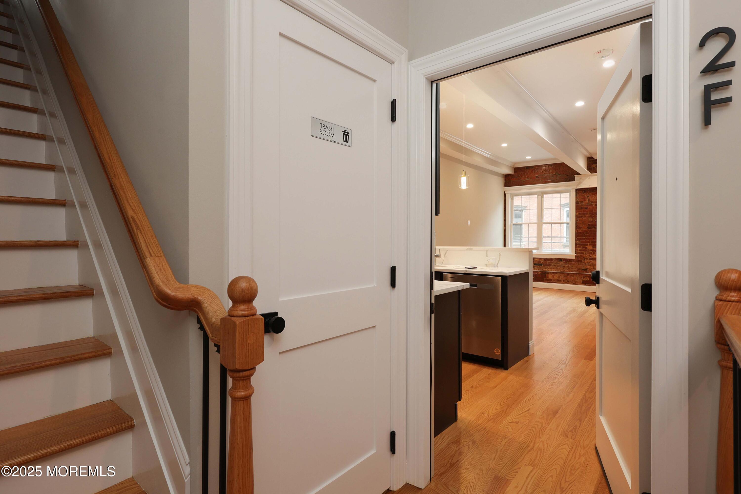 14 East Front Street, Unit 2F Red Bank, NJ 07701 - Photo 15 of 22 a view of a hallway with a living room