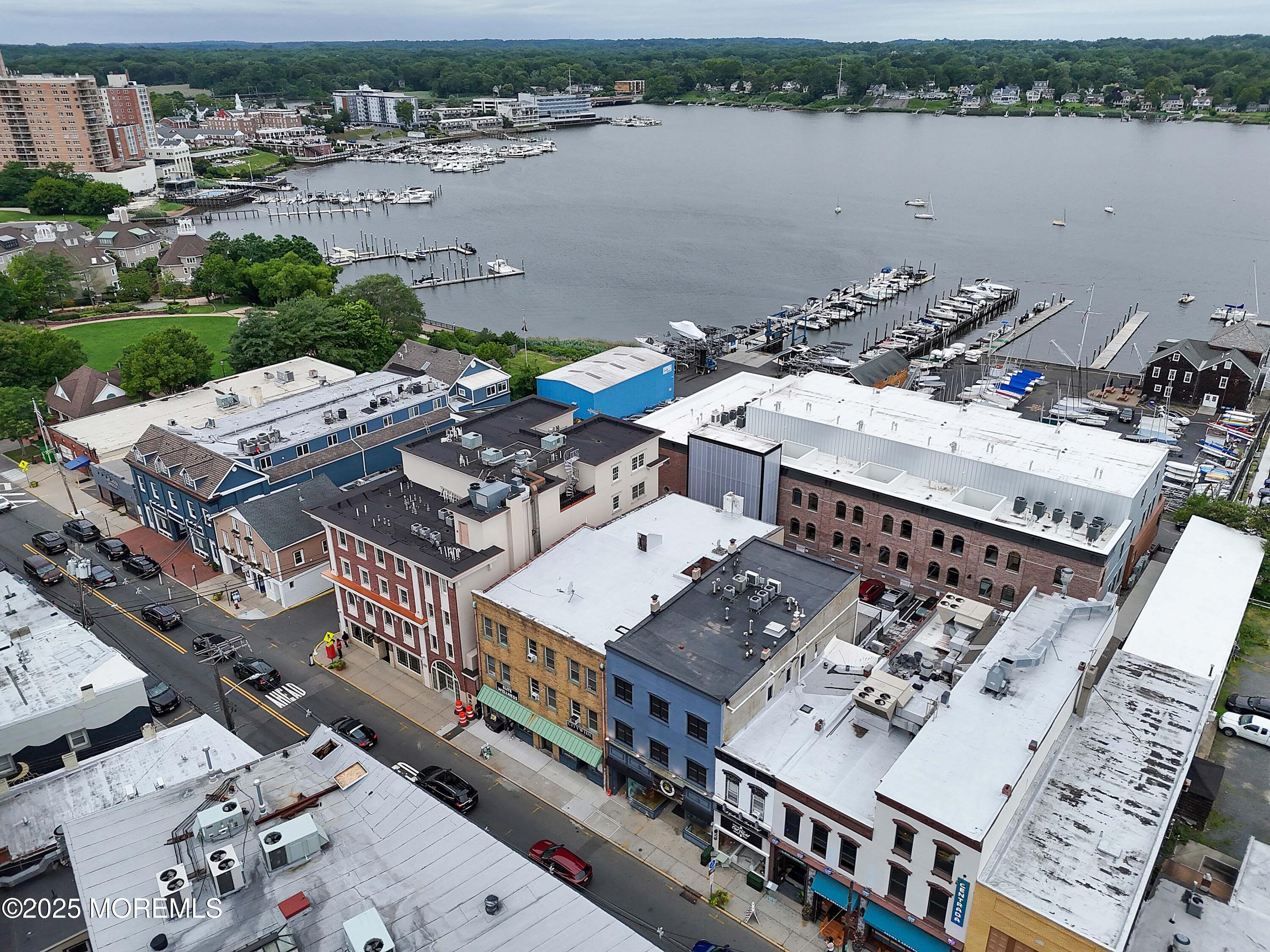 14 East Front Street, Unit 2F Red Bank, NJ 07701 - Photo 18 of 22 a view of a terrace with a lake view