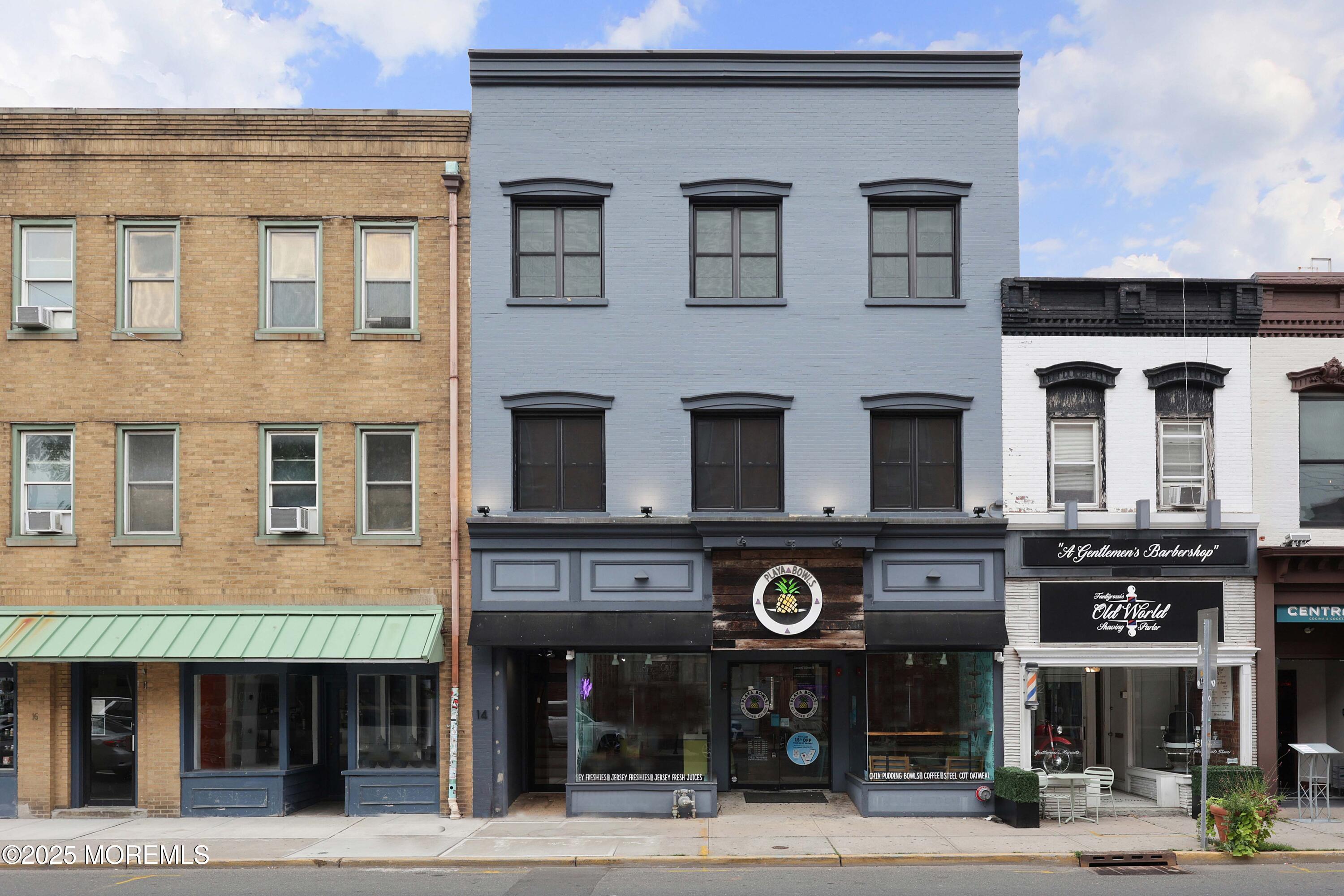 14 East Front Street, Unit 2F Red Bank, NJ 07701 - Photo 22 of 22 a view of a building with a street