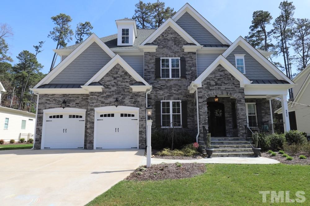 8624 Wapello Lane Raleigh, NC 27613 - Photo 1 of 26 a view of a house with a yard