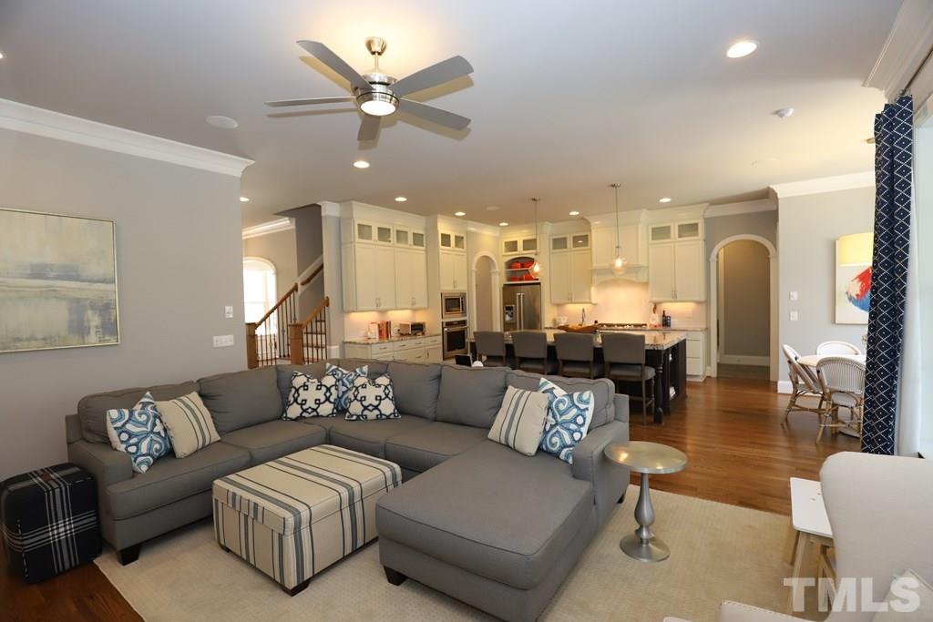 8624 Wapello Lane Raleigh, NC 27613 - Photo 7 of 26 a living room with furniture and kitchen view