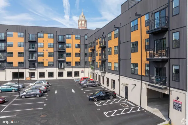 a city street lined with tall buildings