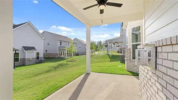 a view of a porch in front of the house