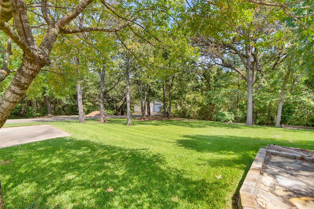649 Anderson Road Whitesboro, TX 76273 - Photo 32 of 40 a view of a park with large trees