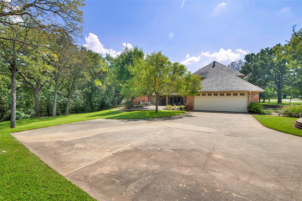 649 Anderson Road Whitesboro, TX 76273 - Photo 33 of 40 a view of a house with a big yard