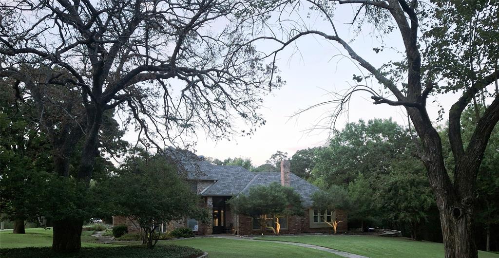 649 Anderson Road Whitesboro, TX 76273 - Photo 40 of 40 a view of a building with trees in front of it