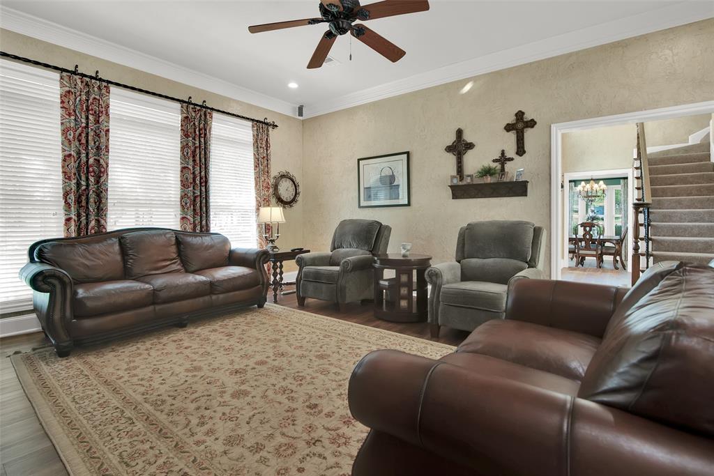 649 Anderson Road Whitesboro, TX 76273 - Photo 7 of 40 a living room with furniture and a large window