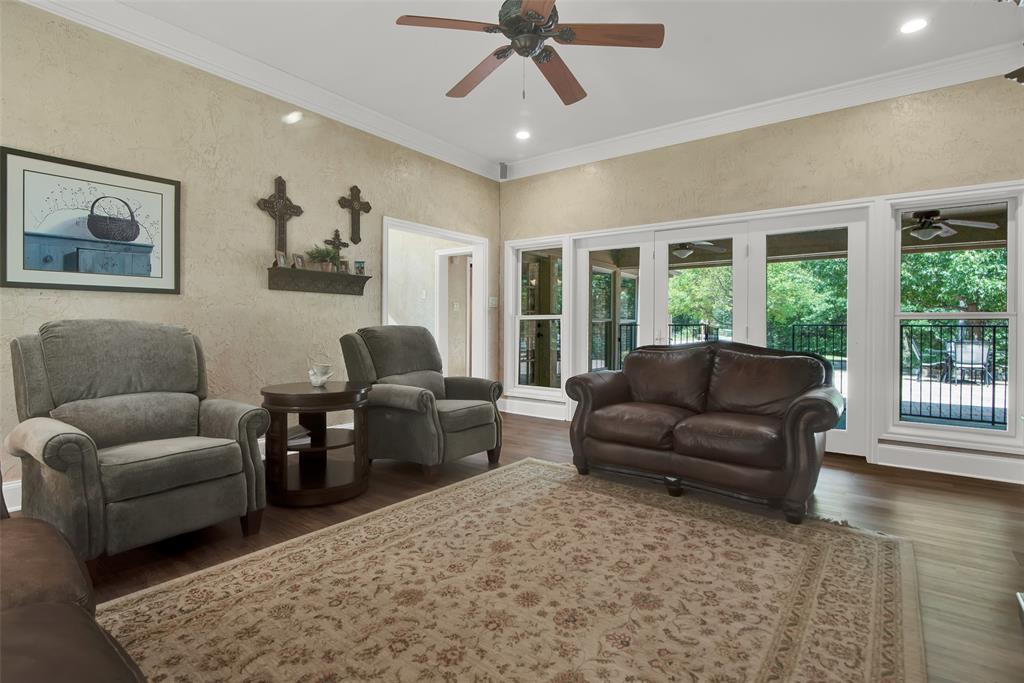 649 Anderson Road Whitesboro, TX 76273 - Photo 8 of 40 a living room with furniture and a large window