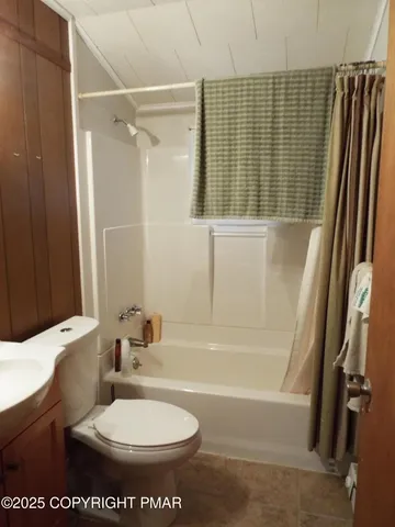 a view of balcony with wooden floor