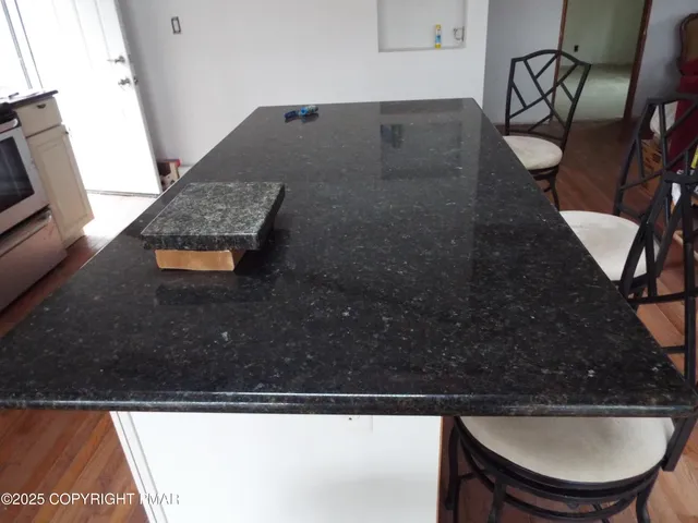 a table and chairs in a room