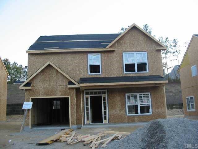5824 Forest Point Road Raleigh, NC 27610 - Photo 1 of 1 a front view of a house with a yard