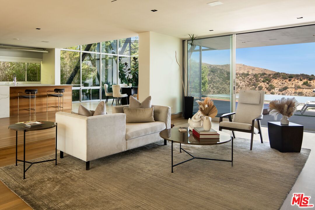 2008 Hercules Drive Los Angeles, CA 90046 - Photo 11 of 36 a living room with furniture and large windows