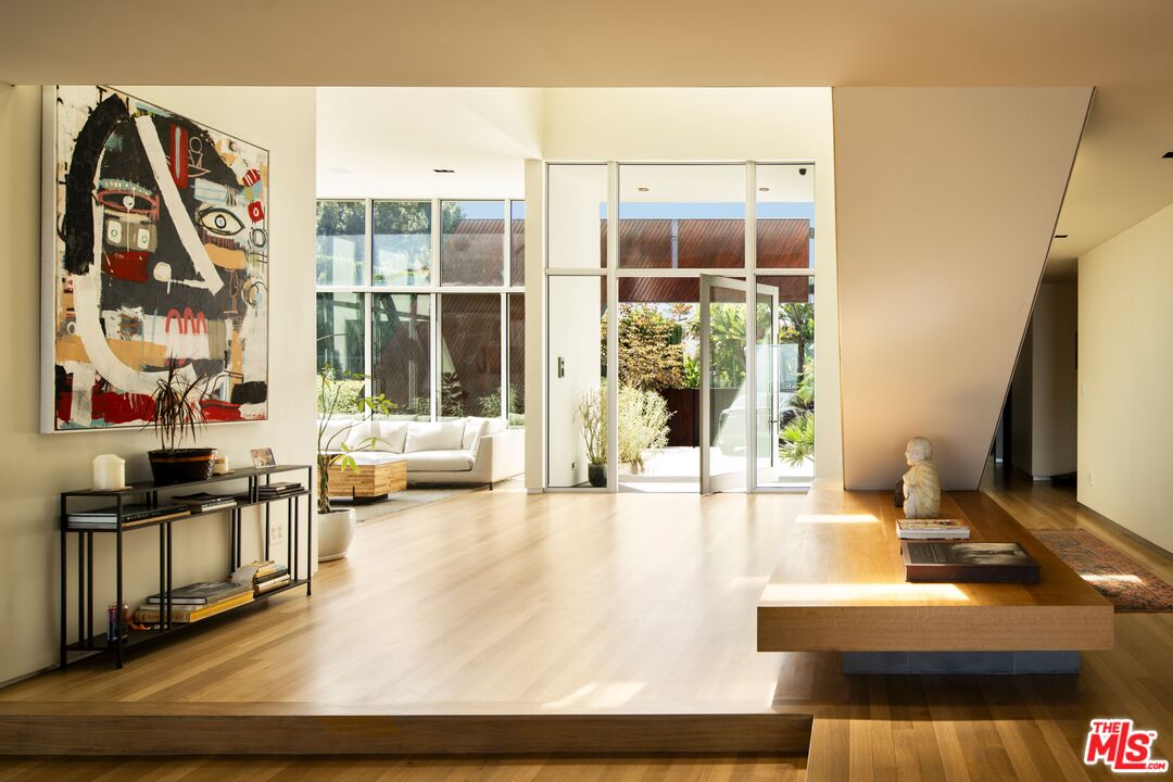 2008 Hercules Drive Los Angeles, CA 90046 - Photo 17 of 36 a living room with large window and a wooden floor