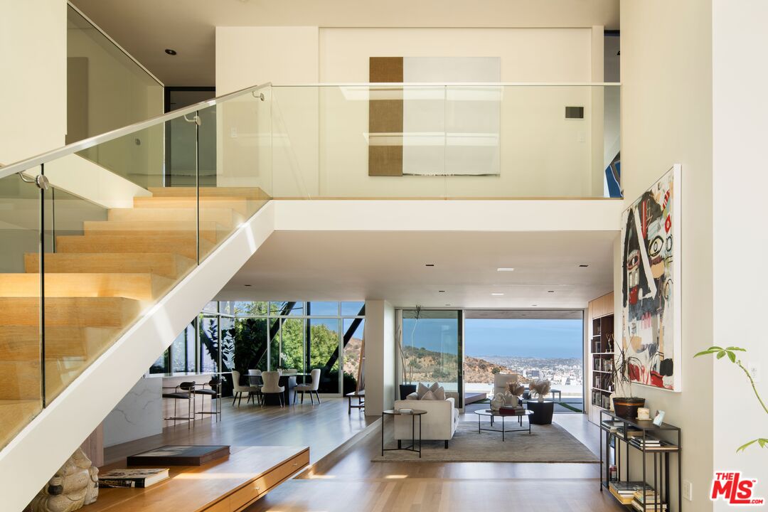 2008 Hercules Drive Los Angeles, CA 90046 - Photo 19 of 36 a view of living room with balcony and furniture